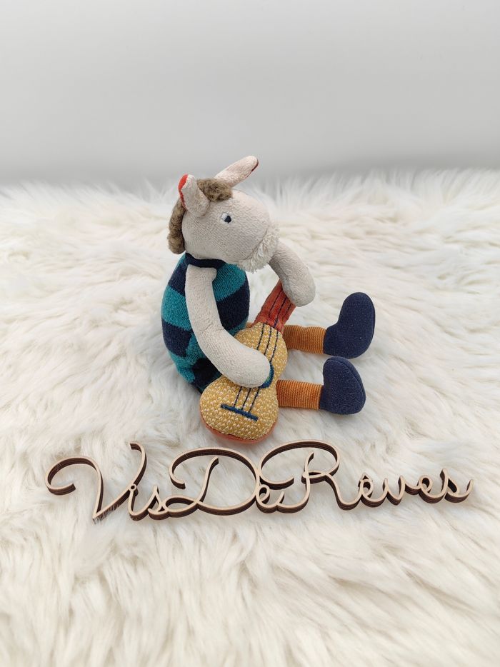 Mini doudou peluche hochet Zadig
Cheval Moulin roty Les Zig et Zag guitare - photo numéro 3