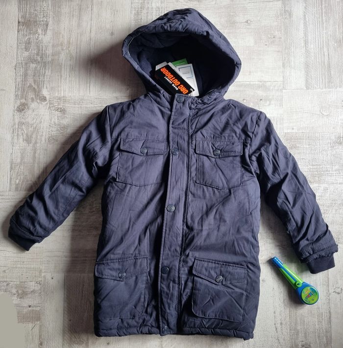 Parka et doudoune sans manches neuve 10 ans