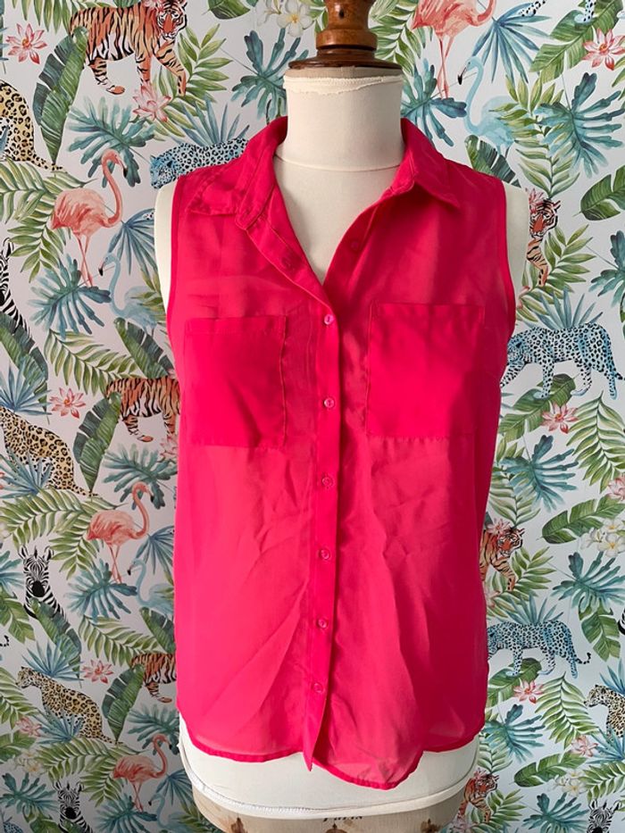 Blouse sans manche rose fuchsia