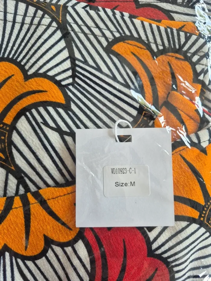 Lot de 2 Tops Une Manche Orange et Bleu Femme Taille M/38 - photo numéro 2
