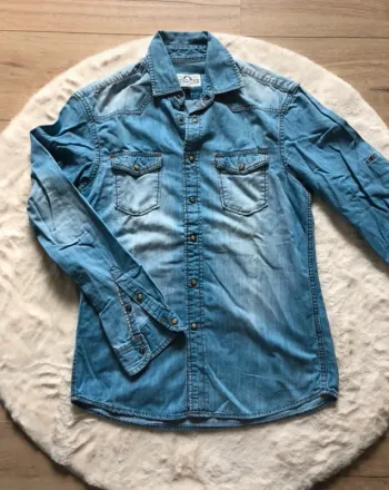 Chemise en jeans légère aspect délavé boutons pression Celio S