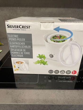 Éplucheur électrique avec essoreuse à à