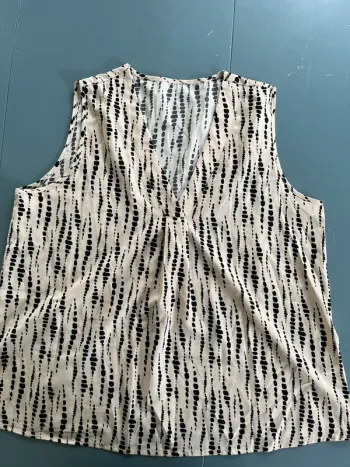 Blouse écru sans manches à motifs noir taille XL