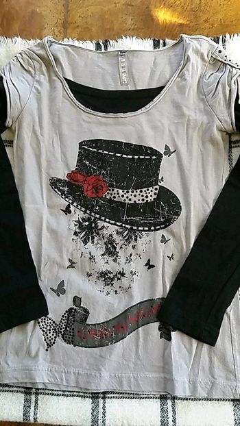 Polo ml fille taille 14ans