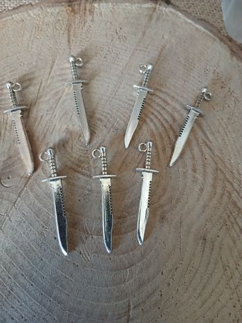 Lot de 7 pendentif couteau