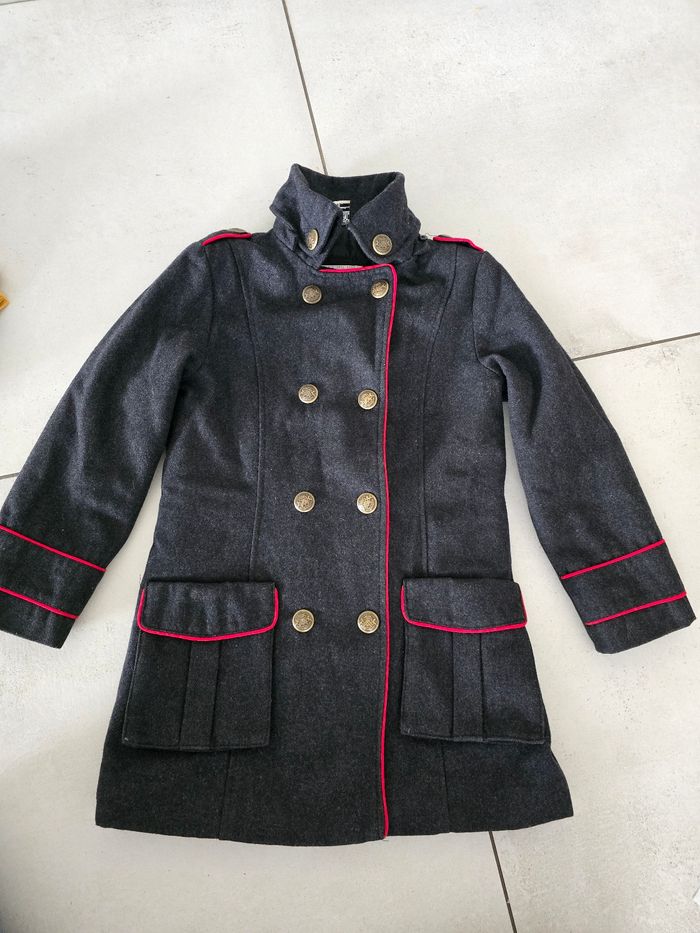 Manteau 8ans tape a l'oeil