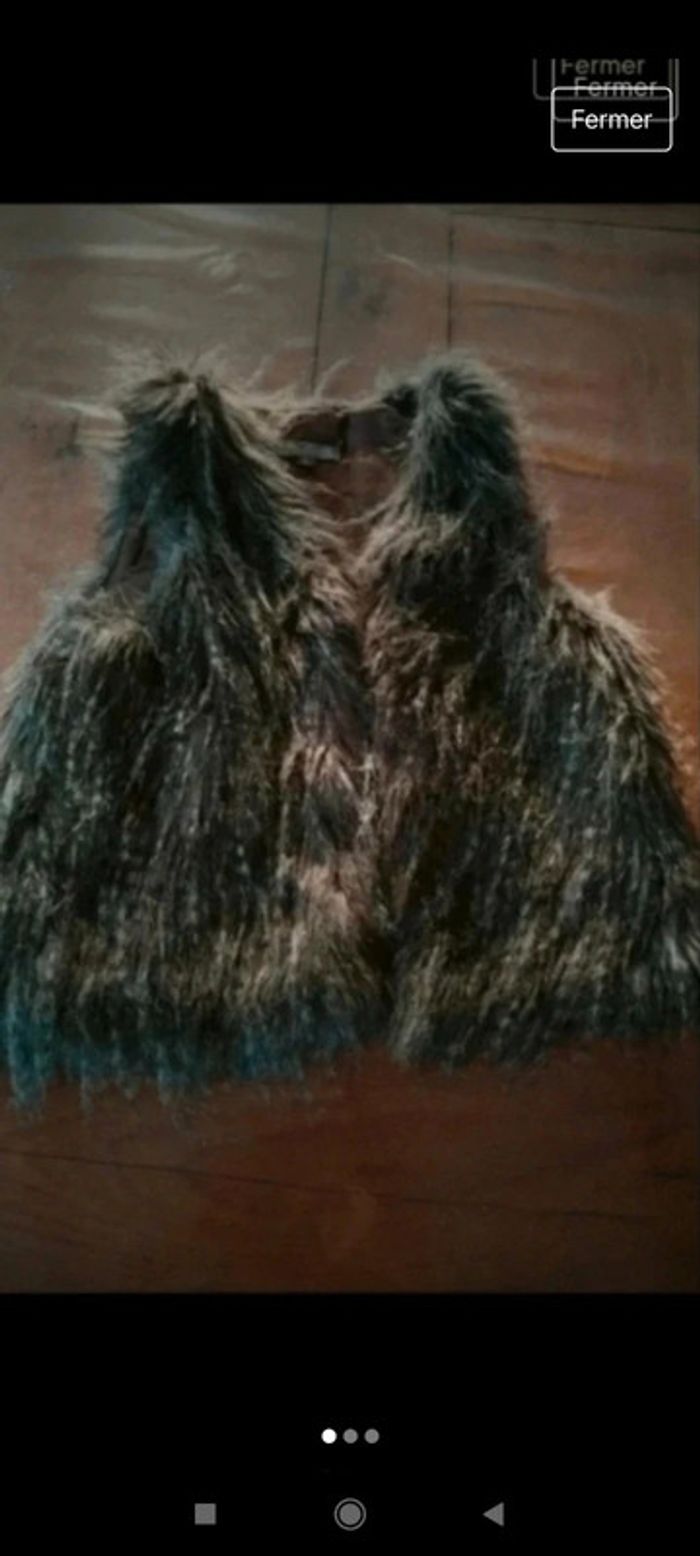 Gilet sans manches 8 ans