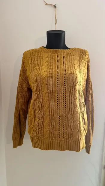 Joli pull torsadé