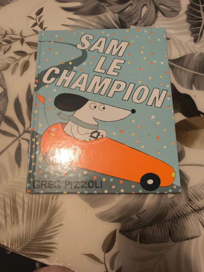 Album sam le Champion