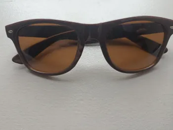 Lunette de soleil femme TBE Magnum