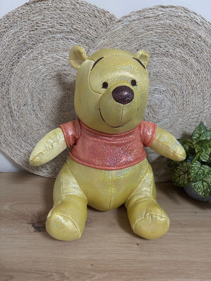 Doudou musical Winnie l’ourson anniversaire 100 ans Disney