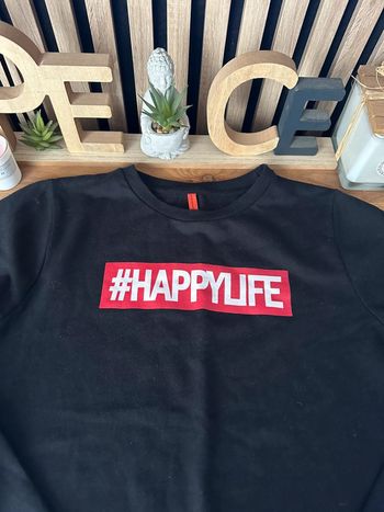 Pull noir ML 12/14 ans