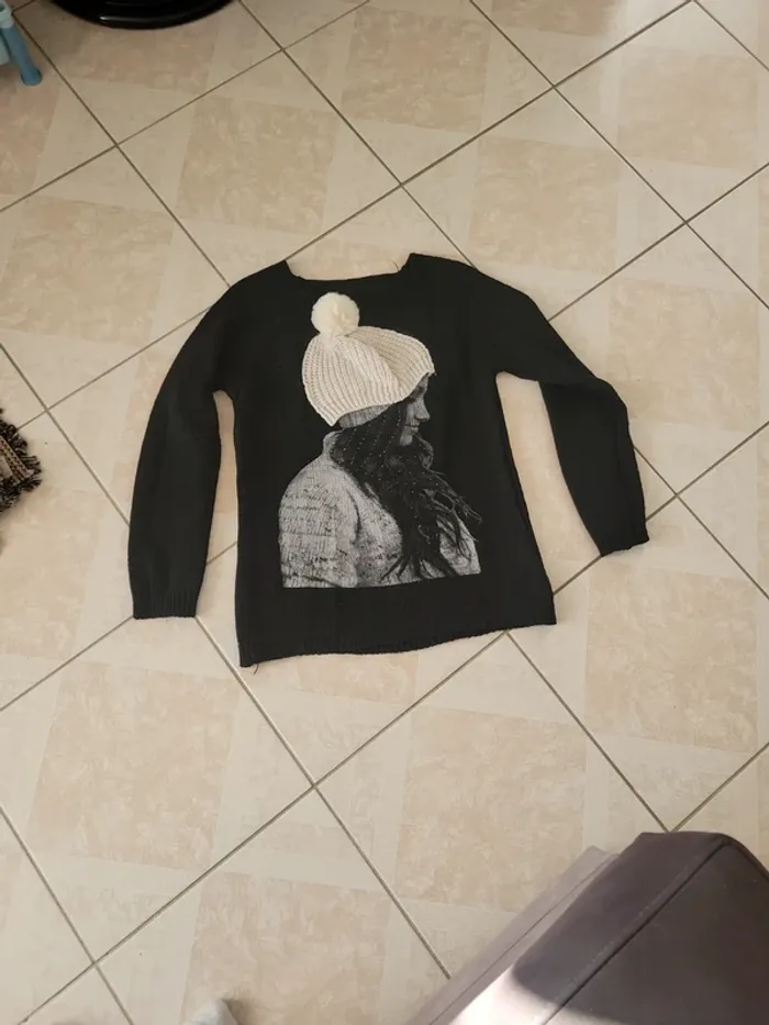 Joli pull taille M