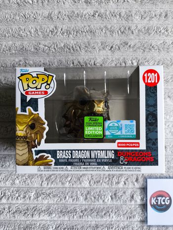 Funko Pop Donjons & Dragons – Brass Dragon Wyrmling n°1201 (Édition limitée 8000 exemplaires)