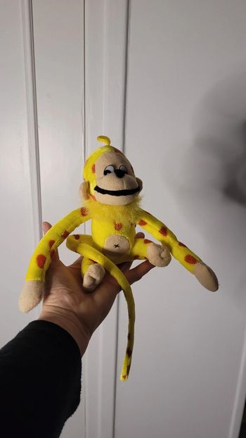 Peluche singe style Marsupilami