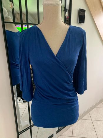 Haut avec manches demi ouvertes taille M
