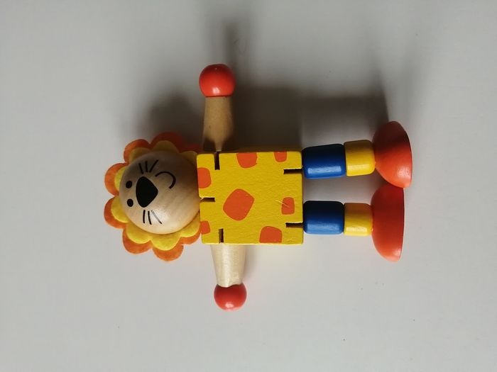 figurine lion en bois articulé - photo numéro 1