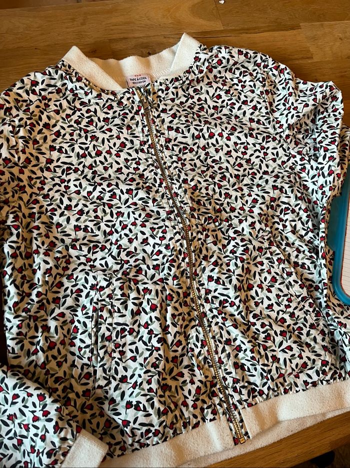 Bombers fleuri tape à l’œil taille 10 ans tbe