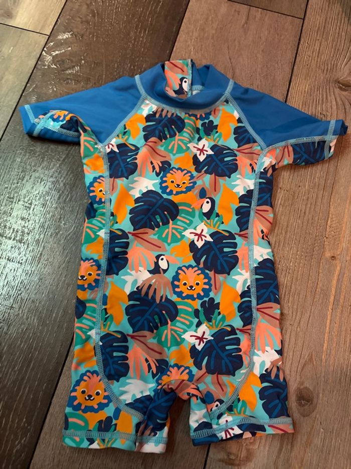 Maillot de bain Combi anti UV bleu orange lion 62/68