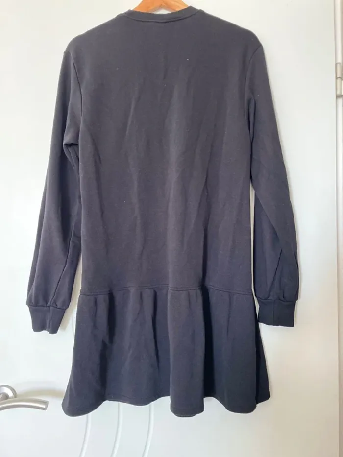 Pull noir h&m évasé effet jupette en très bon état - photo numéro 5