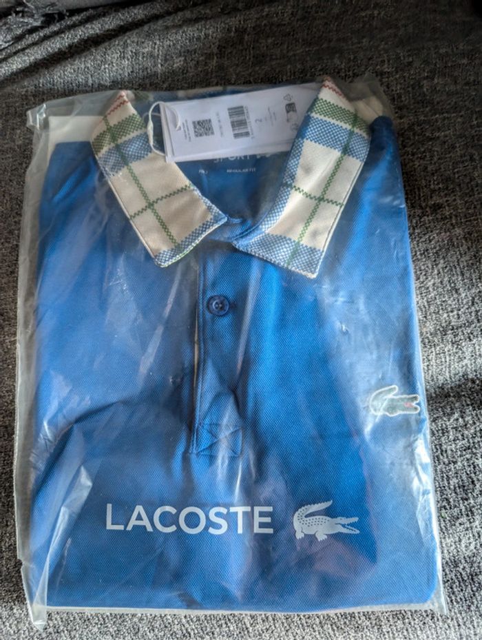 Polo Lacoste. Neuf. XS - photo numéro 12