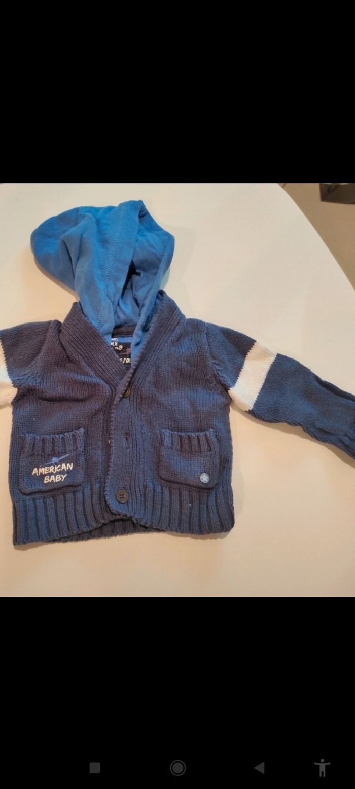 Gilet bleu capuche