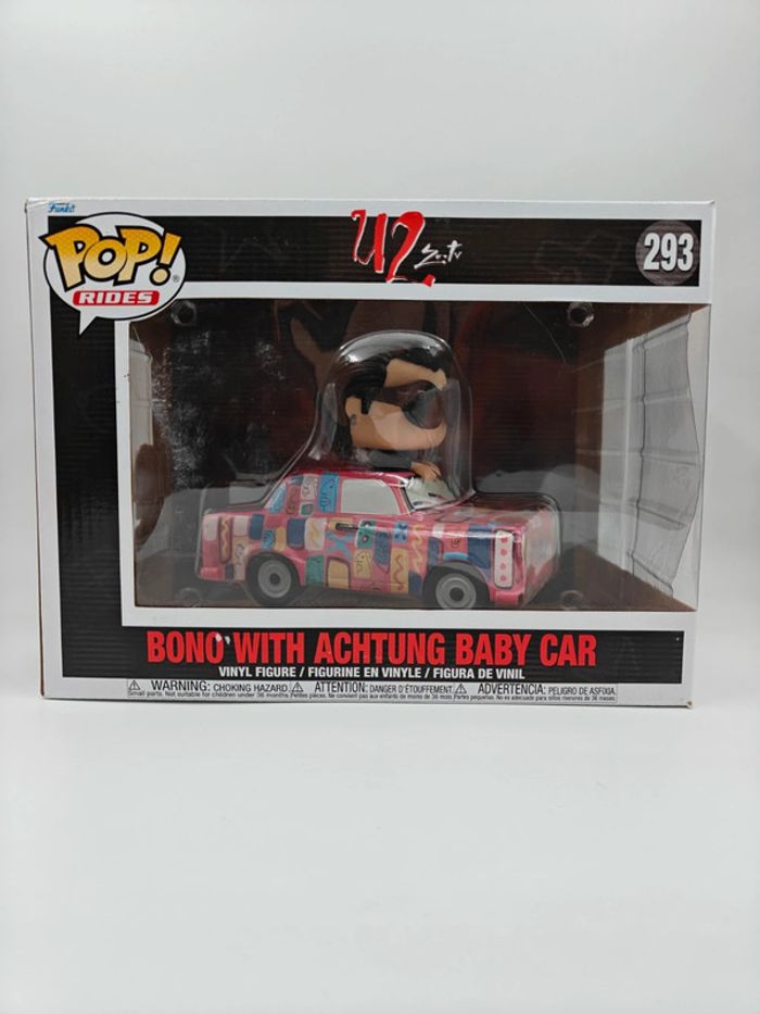 Pop 293 Bono with achtung baby car