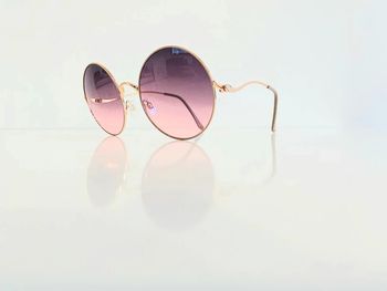 Lunette de soleil femme ronde doré verres dégradés uvprotection catégorie 2