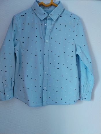 Chemise bleue ciel dessins nœuds papillon