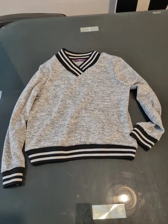 Pull gris à paillette 8 ans fille