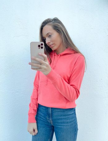 Pull à capuche rose Tissaia