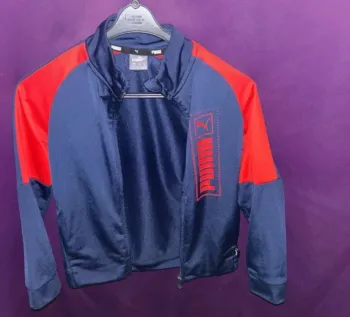 Gilet puma bleu et rouge 8 ans