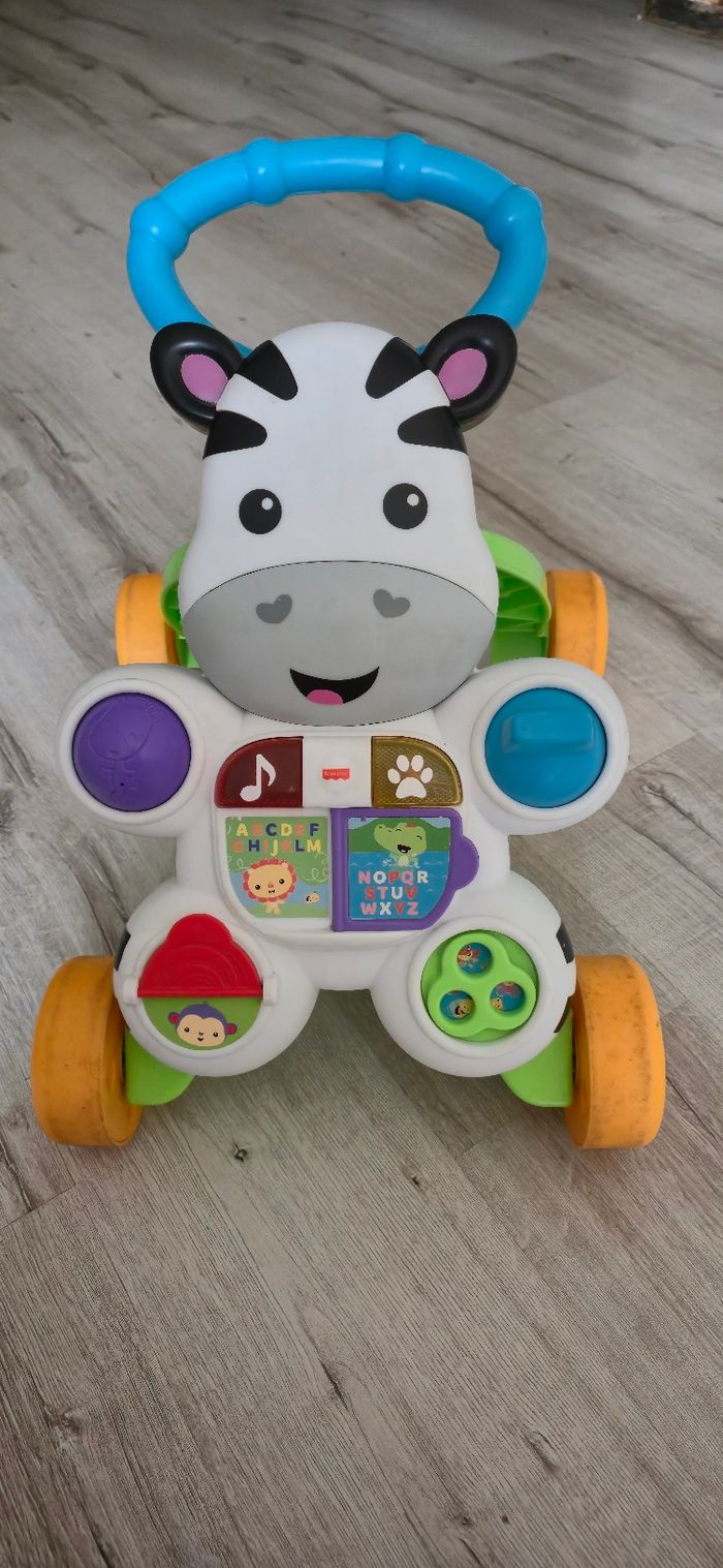 Pousse pousse trotteur