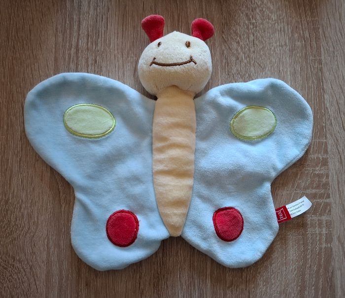 Doudou papillon tex