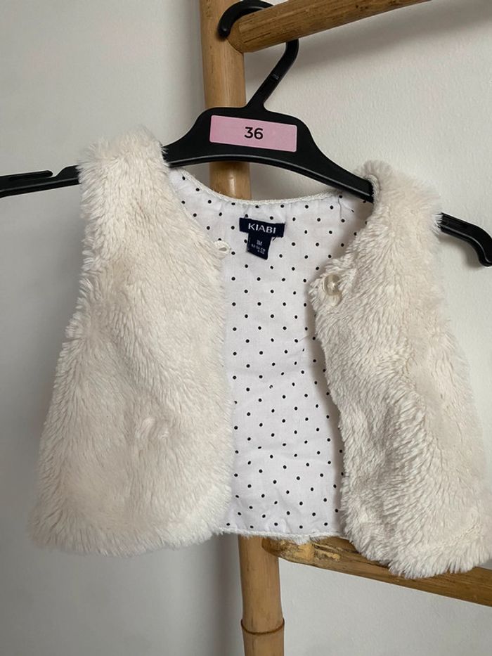Gilet sans manche fourrure très bon état 1 mois