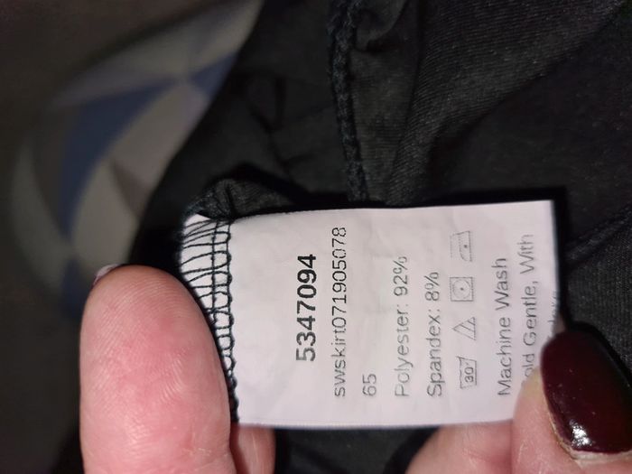 Jupe noire sein s effet drapé devant - photo numéro 5