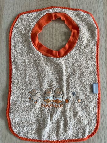 Bavoir à enfiler Naf Naf