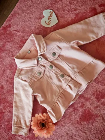 Veste rose poudré