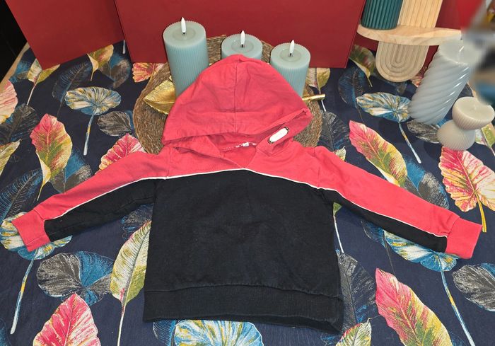Pull rouge/noir 2 ans