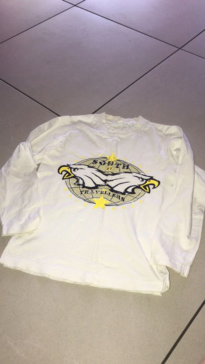 T-shirt blanc manches longues motif têtes d’aigles 140-146