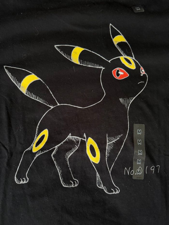 T-Shirt Noctali Pokémon x Uniqlo – L’Édition Sombre & Stylée Qui Fait Sensation - photo numéro 4