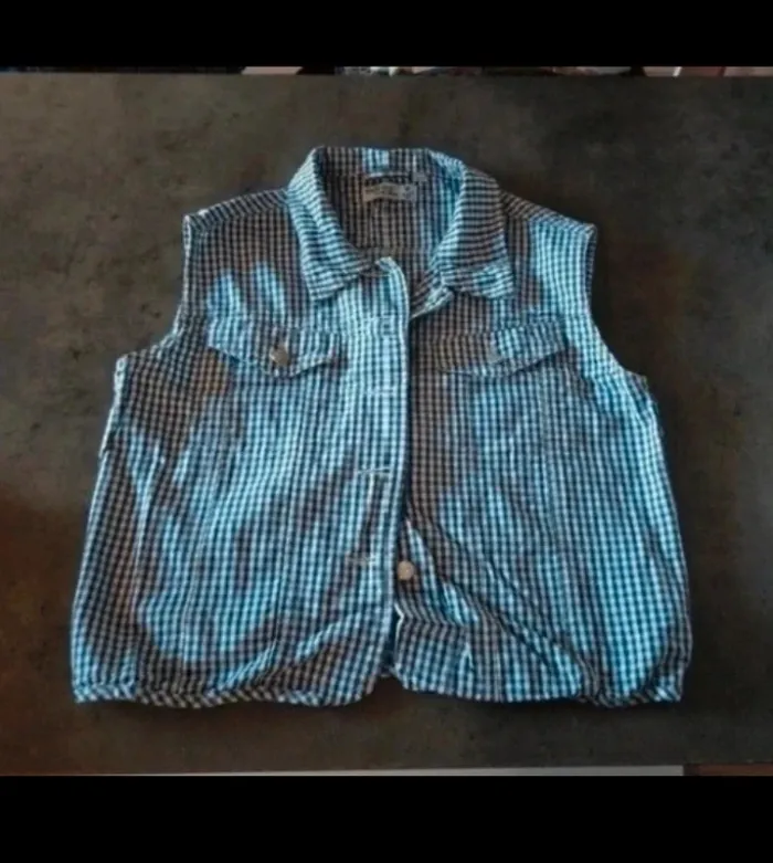 Chemise sans manches à carreaux  bleu marine et blanc taille 16 ans