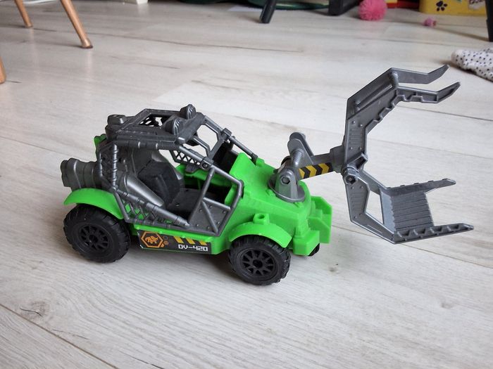Jouet voiture attrape dinosaure type quad vert et gris 30 cm de long - photo numéro 1