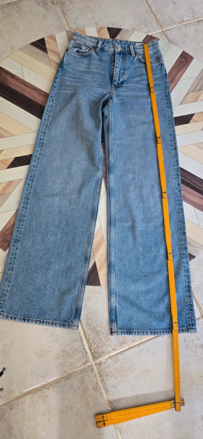 Superbe jean coupe large très tendance, en excellent état ! - photo numéro 6