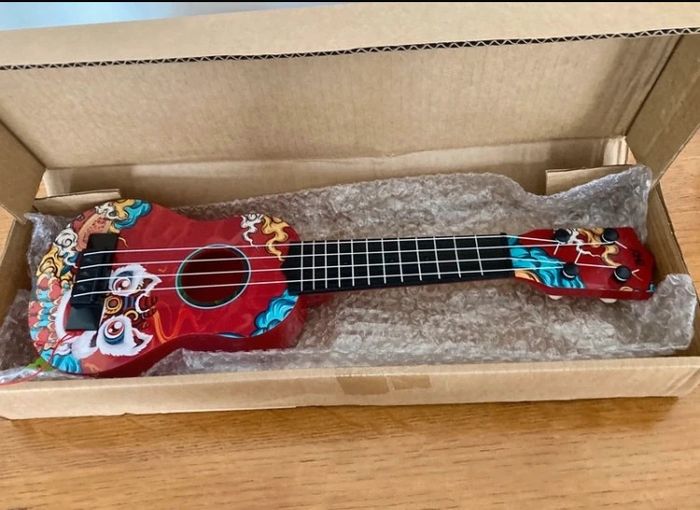 Guitare pour enfants – Rouge  avec motifs – Neuve - photo numéro 3