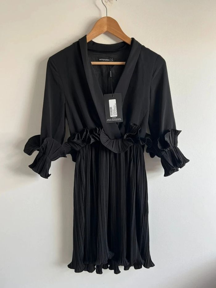 Robe noire plissée