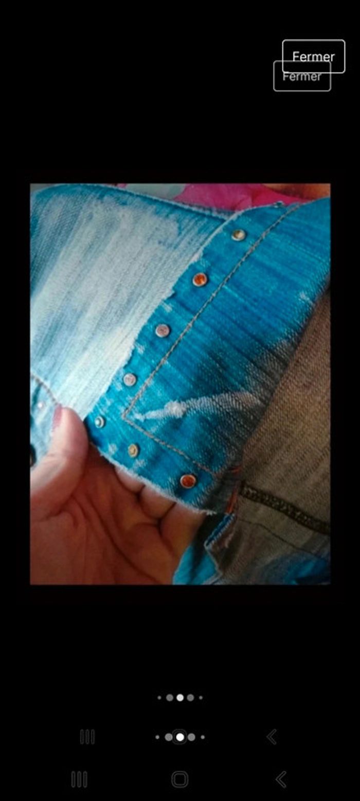 Veste en jean effet usé avec strass - photo numéro 5