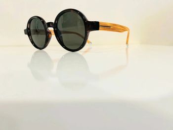 Lunette de soleil mixte ronde façon marron tigré bras effet bois taille moyenne