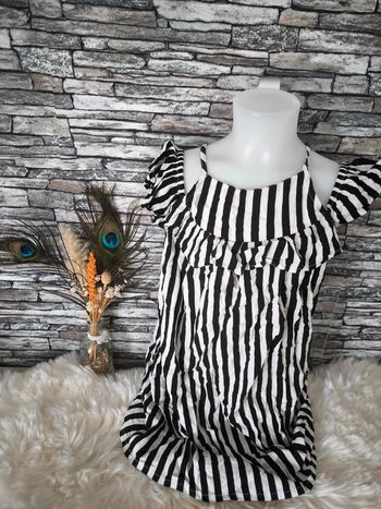 🤍 Jolie robe à rayures noires et blanches Dopodopo en 8 ans 🤍