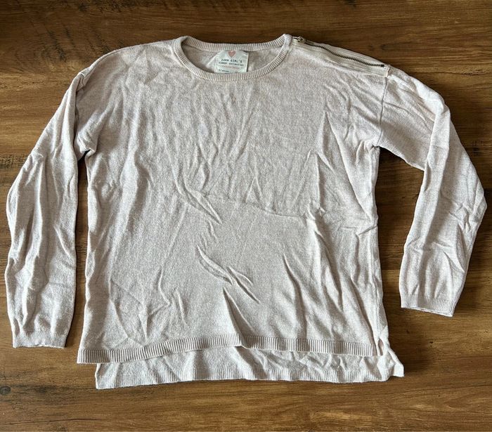 Pull avec zip sur l’épaule